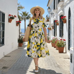 Cotton floral yellow shirt midi dress in white magnolia print